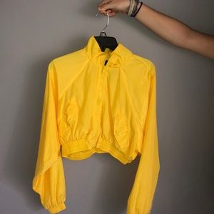 yellow cropped windbreaker. never worn